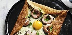 « La Spéciale Pays » (oignons, andouille cuisinée, œuf et emmental)  12€